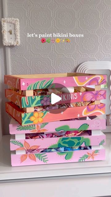 Summer 🌞✨ on Instagram: "this is your sign to paint bikini boxes! 🌺🌞✨🎨 the perfect summer diy! So fun to create and I’m in love with how organized my swimsuit collection is! Which box is your favorite?👙✨🌞 available for purchase on my Etsy: DrippinSpice 🔗in bio! 💘 paint pens are from @shuttleartllc 🎨  #summer #summerdiy #bikinibox #bikiniboxes #bikini #bikinicollection #painting #diy #summervibes #summeraesthetic #summeractivity #pinterest #pinterestinspired #coconutgirl #beach #beachlife #beachaesthetic #swimsuit #swimsuitseason #swimsuitcollection" Easy Bikinis Box Painting, Bikinis Box Painting Ideas, Beachy Girl, Summer Drawings, Summer Diy Projects, Swimsuit Collection, Summer Fun List, Beach Diy, Painted Boxes