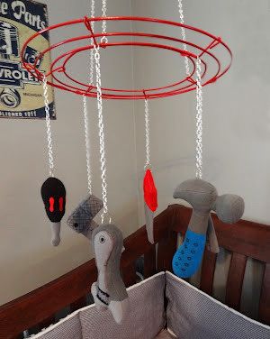 Homemade DIY baby crib mobile with felted mechanic tools as decorations.  The hanger is a wire form painted red and the toy tools are made of felt bought at a local store. Diy Baby Crib, Baby Mechanic, Car Themed Nursery, Baby Crib Diy, Crib Mobiles, Car Nursery, Vintage Chevy, Boy Nursery Themes, Diy Crib