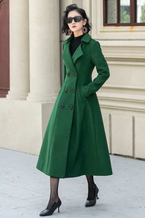 This made-to-measure green long a line wool coat，crafted with an eye for detail and a commitment to excellence.Its premium wool fabric provides unparalleled warmth and comfort, making it the ideal choice for staying cozy and chic during the colder months. DETAIL * 50% wool, 50% fiber,nylon, etc. * Fully satiny lining, more nice to the touch body * Two side seam pockets * Front buttons closure * Long wool coat * A line coat * Formal coat * For autumn and winter * Dry clean only * Lean More about the items From the FAQs on the page bottom More color in No.1: https://etsy.me/4fGTZ6f MODEL SIZE Bust 85 cm(33.4") Waist 67 cm(26.7") Height 168cm (5' 6") She wears size XS Choose CUSTOM Order if you * Need a better fit * Can't find your size in our size Chart * Change the Style * Chang the Length Green Coat Dress, A Line Coat, Dress Coat Outfit, Long Wool Coat Women, Green Winter Coat, Green Wool Coat, Formal Coat, Elegant Coats, Long Wool Coat