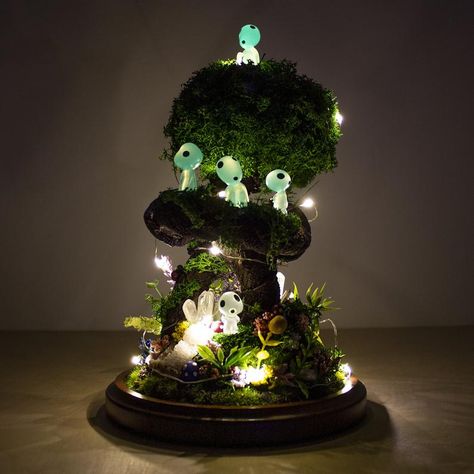 This custom Kodama miniature garden is the perfect piece for your Princess Mononoke collection, as a handmade gift idea for your loved ones, family, friends, and any Studio Ghibli fans. #studioghibli #ghibli #kodama #kodamaterrarium Kodama Terrarium, Artificial Terrarium, Tree Spirits, The Enchanted Forest, Princess Mononoke, Miniature Garden, Glass Dome, Enchanted Forest, Cultura Pop