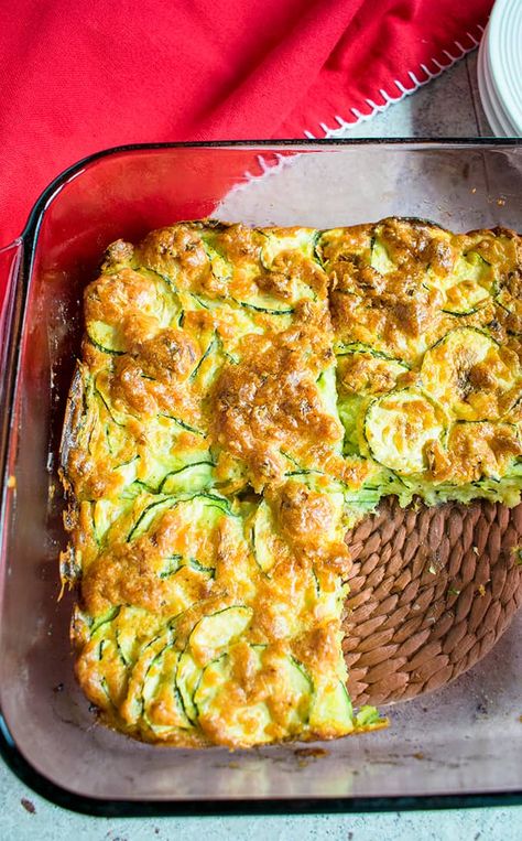 This Italian Zucchini Bake is made with Romano and Parmesan and is so good! You'll love this zucchini casserole. Make it for a side dish, appetizer or vegetarian main dish! #zucchinibake #italianzucchinirecipes #italianzucchinibake Sicilian Zucchini Recipes, Zucchini Feta Bake, Broccoli And Zucchini Recipes, Zucchini Potato Recipes, Zucchini Souffle Recipe, Italian Zucchini Casserole, Bisquick Zucchini, Zucchini Baking, Zucchini Side Dish Recipes