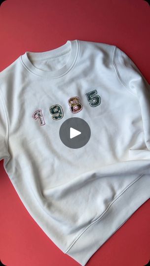 496K views · 42K reactions | What’s your year? Reverse appliqué is a fun way to add text and numbers to garments. I love how the pretty fabrics show through 🧡
.
.
#upcycledclothing 
#upcycledfashion 
#embroideredflowers 
#embroideredclothing 
#embroidereddenim 
#embroideredclothes 
#embroideredflorals 
#learntoembroider 
#mindfulart 
#slowstitching 
#sewingproject 
#embroiderypatterns 
#bordadolivre 
#createdtocreate 
#diycrafts 
#slowcraft 
#dmcthreads 
#dmcembroidery 
#springflowers 
#embroiderydesign 
#beginnerembroidery 
#embroiderywork 
#denimembroidery 
#sustainablefashion 
#embroiderhappyhoops 
#embroiderytutorial 
#embroideryprocess 
#embroideryproject 
#handsew | Jenny ~ Embroidery Art, Design & Crafts | Lesfm · Tramp Applique Stitches, Learning To Embroider, Denim Embroidery, Textile Art Embroidery, Sweet Clothes, Reverse Applique, Hand Embroidery Videos, Contemporary Embroidery, Altered Couture