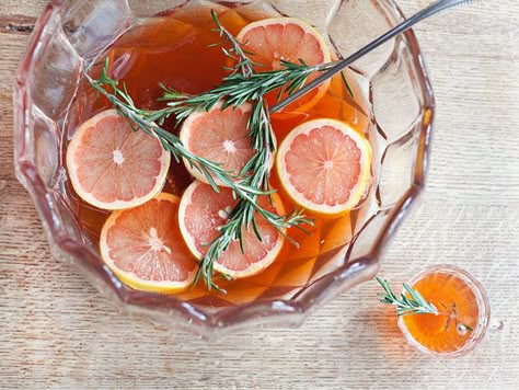 In addition to being gorgeous, this punch has a delicate, fresh flavor: the sweetness from bourbon, honey, and sparkling wine is well-balanced by tart, fresh grapefruit and rosemary-laced Aperol. Best Punch Recipe, Rosemary's Baby, Batch Cocktails, Punch Drinks, Holiday Punch, Thanksgiving Cocktails, Fall Cocktails, Milk Shakes, Serious Eats