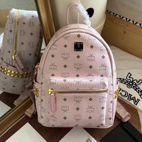 MCM pink small backpack, backpack Mcm Handbags, Cell Phone Holster, Small Backpack, On The Side, Boot Sandals, Rain And Snow Boots, Platform Shoes, Vivienne Westwood, Rivets