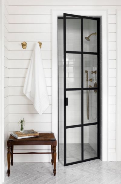 31 Black Framed Coastal Shower Door Ideas | Sebring Design Build Industrial Shower Doors, Natural Bathroom Design, Popular Bathroom Designs, Coastal Shower Doors, Framed Shower Door, Bathroom Design Trends, White Shiplap, Home Luxury, Bathroom Trends