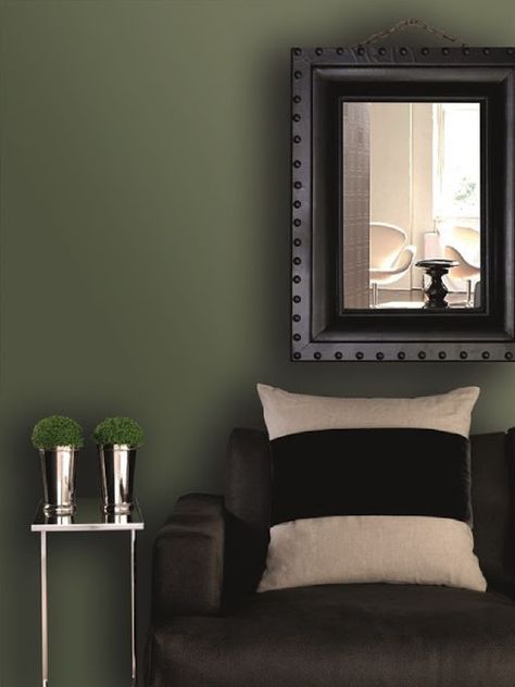 Deep green walls and black in a moody living room. Come explore Dark Green Paint, Autumnal Greens Olive Green Rooms, Olive Green Bedrooms, Dark Green Rooms, Dark Green Paint, Olive Green Paints, Green Bedroom Walls, Green Painted Walls, Dark Green Kitchen, Moody Living Room