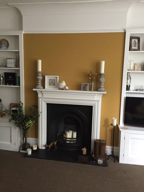 Farrow and Ball India yellow on our chimney breast. Mustard Fireplace Wall, Farrow And Ball India Yellow Living Room, Farrow And Ball Sudbury Yellow, Sudbury Yellow Farrow And Ball, Painted Chimney Breast, India Yellow Farrow And Ball, Feature Chimney Breast, Sudbury Yellow, Terrace House Interior