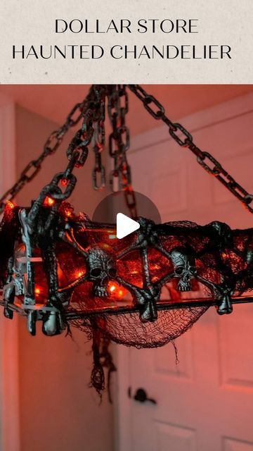 Jessica Cole on Instagram: "Haunted chandelier!! This has the be THE coolest Halloween DIY to come out of the dollar store this season! 

Here’s what you need (all items from @dollartree)

4- skeleton fence post
4- plastic chain 
Creepy fabric
String lights 
Zip ties 

Directions:

1) cut the ground spikes off of the fence posts 

2) create a square with the 4 posts and zip tie together 

3) slip the plastic chain into each corner of the fence post and zip tie 

4) hang lights and zip tie 

5) drape creepy fabric over the top 

Plug lights in and enjoy!!! 👻 

#halloweendecor #halloweendecorations #halloweendecorating #halloweendecorideas #diyhalloweendecorations #diyhalloweendecor #spookydecor #spookyseason #dollarstoredecor #dollarstorediy #halloweendollartree #halloweendollarstore #fall Dollar Store Halloween Diy, Halloween Chandelier, Hanging Baskets Diy, Halloween Fence, Horror Crafts, Halloween Lamps, Dollar Tree Halloween, Halloween Props Diy, Holiday Decor Halloween