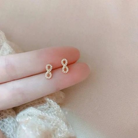 @MillieBaeBtq posted to Instagram: Classic & Chic, These Tiny Infinity Shaped Gold & Crystal Studs Are Sure To Be A Staple Accessory... #MILLIEBAEBOUTIQUE #wiwjewelry #wiw #wiwt #earringsoftheday #infinity #aboutalook #boutiqueshopping #boutiquefashion #smallbusiness #519shoplocal #smallbusinessowner #classics # #earringfashion #solopreneur #jewelry Symbol Earrings, Infinity Earrings, Infinite Love, Infinity Symbol, Classic Chic, Earrings Sterling Silver, Cz Stone, Silver Diamonds, Cute Earrings