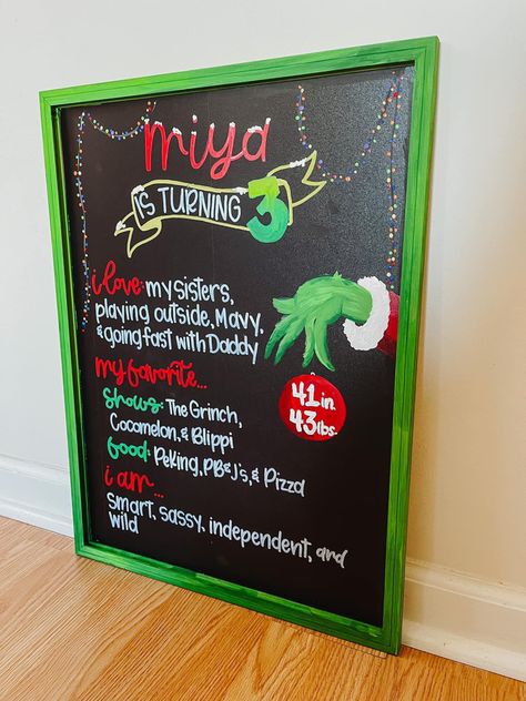 Hand painted grinch/christmas themed birthday chalkboard/milestone board! You can find one like this and more on the Etsy shop or Facebook. Mean One Grinch First Birthday, Grinch First Birthday Party, Grinch Birthday Party, Grinch Birthday, The Grinch Christmas, Milestone Board, Grinch Party, 1st Birthday Party Themes, 1st Birthday Themes