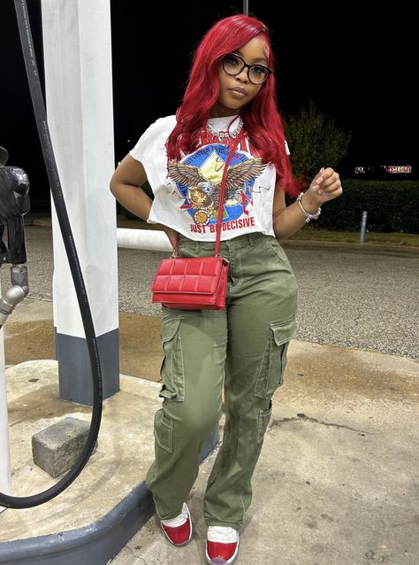 Cargo Pants Outfit Black Women Heels, Oliver Green Pants Outfit, Red Camo Cargo Pants Outfit, Red Cargo Pants Outfit Street Styles, Army Cargo Pants Graphic Tee Outfit, Cargo Green Pants Outfit, Trendy Red Fall Cargo Pants, Olive Green Cargo Pants Outfit, Green Cargo Pants Outfit