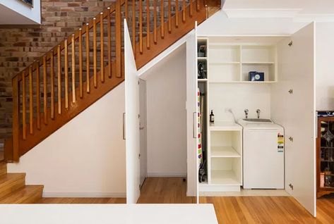 Laundry Designs, Concealed Laundry, Ironing Board Storage, Contemporary Laundry Room, Hidden Laundry, Laundry Design, Cabinetry Design, Lake Cottage, Shipping Container Homes