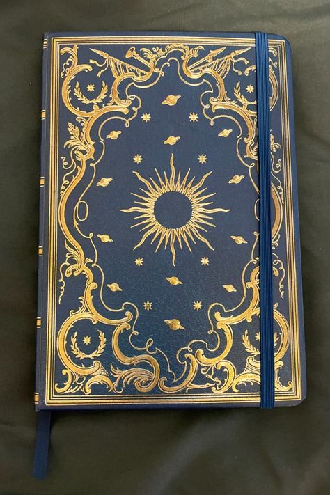 Beautiful celestial (Sun, planets, stars, etc.) gold foil journal with blue ribbon Planet Astrology, Celestial Journal, Book Rebinding, Press Ad, Book Cover Art Design, Books Business, Peter Pauper Press, Binding Covers, Book Cover Design Inspiration