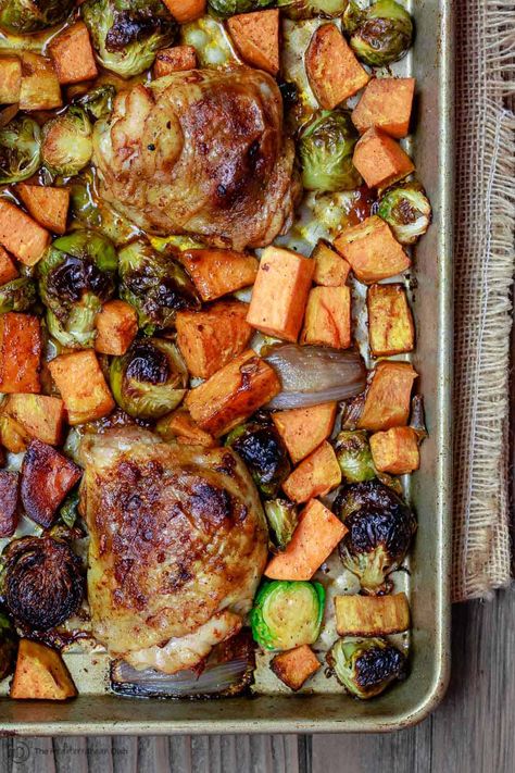 Chicken and Vegetables on a sheet pan after being baked Paleo Chicken Thighs, Brussels Sprouts And Sweet Potatoes, Greek Chicken And Potatoes, Chicken Roasted, The Mediterranean Dish, Potato Dinner, Paprika Chicken, Recipe Sheets, Pan Chicken