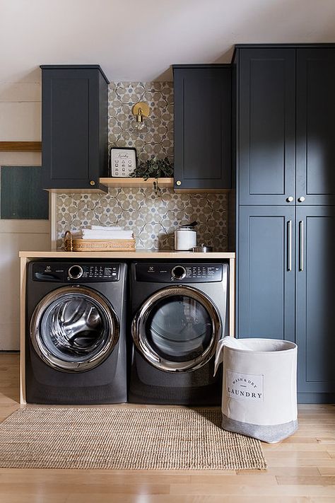 Modern boho laundry room, laundry nook, floral tile backsplash, rattan tray, blue laundry room, navy, modern farmhouse, renovation Shelf Kitchen Design, Navy Blue Laundry Room, Hex Backsplash, Wood Shelf Kitchen, Boho Laundry, Blue Laundry Room, Butcherblock Countertops, Floating Wood Shelf, Blue Laundry Rooms