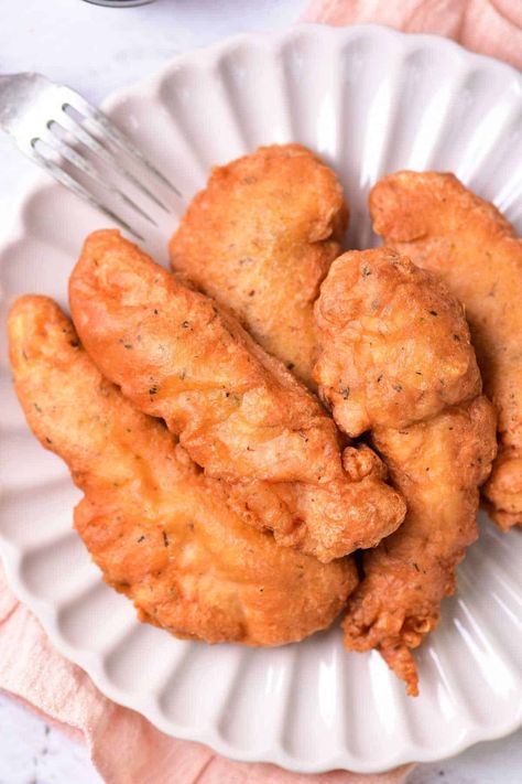 Fried beer battered chicken tenders for dinner is a cheap family friendly meal we love. Dipped into a light tempura batter with lager. Beer Battered Chicken Tenders, Battered Chicken Tenders, Batter For Chicken Tenders, Pan Fried Chicken Tenders, Beer Battered Chicken, Battered Chicken, Deep Fried Chicken Wings, Fish Batter Recipe, Chicken Batter