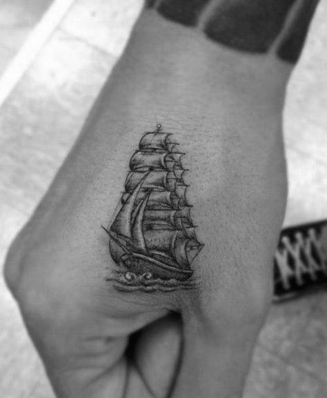 Sailing Shaded Ship Mens Small Tattoo Designs On Hand Small Ship Tattoo, Herren Hand Tattoos, Boat Tattoo, Dr Woo, Pirate Tattoo, Men's Small Tattoo, Tattoo Trend, Nautical Tattoo, Ship Tattoo