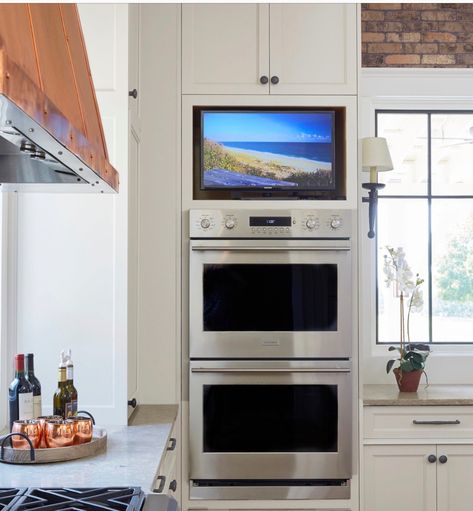 TV built in above wall appliances = brilliant! Stacked Ovens, Decorating Above Kitchen Cabinets Ideas, Decorating Above Kitchen Cabinets, Tv In Kitchen, Above Kitchen Cabinets, Kitchen Wall Cabinets, Flat Screen Tv, Architecture Interiors, Double Oven