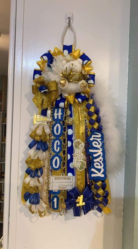 Homecoming Mums Dance Team, Mums Homecoming Blue And Gold, Blue And Yellow Homecoming Mums, Blue And Yellow Mums Homecoming, Texas Homecoming Mums Diy, Home Coming Mum Ideas, Drill Team Homecoming Mum, Mums Hoco, Trifold Ideas