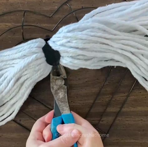 Heart Wreath DIY (Using a Mop Head) https://www.southerncrushathome.com/heart-wreath-diy/ Wreath Diy Dollar Tree, Heart Wreath Frame, Wire Heart Wreath, Heart Wreath Form, Rope Wreath Diy, Heart Wreath Diy, Cross Wreath Diy, Valentine Wood Crafts, Valentine Wreath Diy