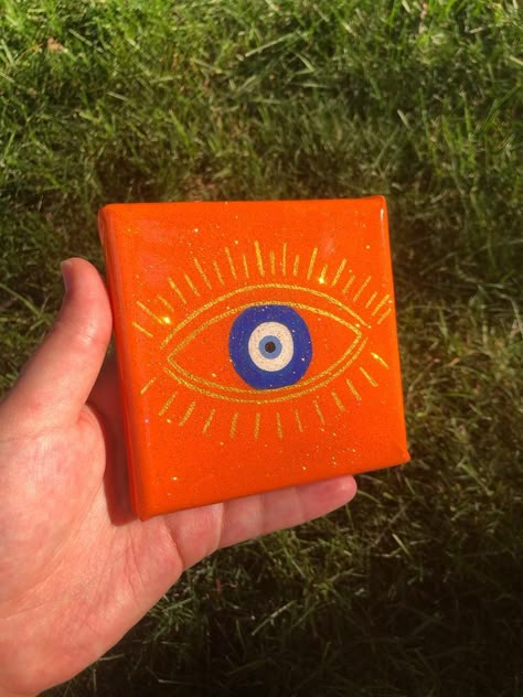 Designer Painting Canvases, Orange Painting Ideas On Canvas, Boho Drawing Hippie Art, Evil Eye Painting, Mini Tela, Painting Resin, Evil Eye Art, Trippy Painting, Acrylic Painting Flowers