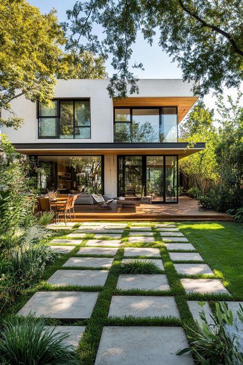 40 Modern House Yards That Do It Right Modern House With Porch, 200sqm House Design, Modern House Yard, 200 Sqm House Design, 200sqm House, Modern Japanese House Exterior, Residential House Design, Modern Concrete House, Paver Path