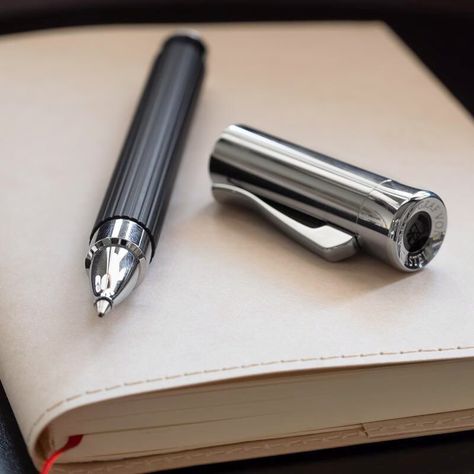 For a luxurious writing experience it’s hard to look past a rollerball pen like this Tamitio by Graf von Faber-Castell. It has a finely fluted barrel with a matte lacquer finish. Black Line, Metal Trim, Pen Refills, Luxury Gift Box, Rollerball Pen, Writing Tools, Faber Castell, The Culture, Ballpoint Pens