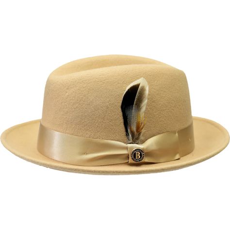 This center-dent hat is a perfect everyday accessory. Featuring a soft wool felt fedora designed with a center dent crown, trimmed with a sleek shiny ribbon hatband and a stingy snap brim, this fedora will get you through fall and winter in total style! And don't forget the interior is satin lined with a moisture-wicking cotton sweatband for a perfect fit! Brim: 1 7/8" Stingy Snap Material: 100% Fine Australian Wool Felt Crown Height: 4.5" Interior: Moisture-Wicking Cotton Sweatband Hat Band: 2-Tone 1.5" 16-Ligne Grosgrain Shape: Crushable Center Dent Interior: Satin Lined Removable B Logo Pin Feature: This hat comes with a size Adjustable string attached to Velcro. simply pull the built-in Adjustable String to your desired size and attach it to the Velcro. Homburg Hat, Felt Crown, B Logo, Homburg, Logo Pin, Gold Hats, Felt Fedora, Pin Logo, Hat For Man