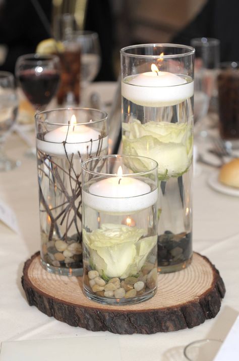 From son's wedding reception: Centerpiece with floating candles, submerged roses, branches and pebbles. Floating Candles And Bud Vase Centerpiece, Orbeez Wedding Centerpiece Ideas, Orbeez Centerpieces Wedding Reception, Water Beads Centerpiece, Centerpiece With Floating Candles, Water Centerpieces, Easy Diy Fall Crafts, Wedding Reception Centerpiece, Vintage Wedding Centerpieces