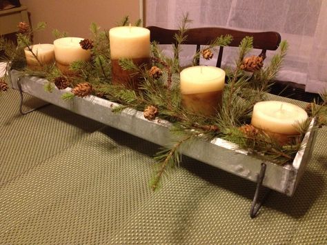 Chicken feeder centerpiece.  Not my idea; I found a picture on the internet and made my own. Chicken Feeder Centerpiece, Chicken Feeder Ideas Repurposed, Chicken Feeder Decor, Chicken Feeder Ideas, Baguette Basket, Rusty Junk, Basket Centerpieces, Chicken Feeders, Farmhouse Tray