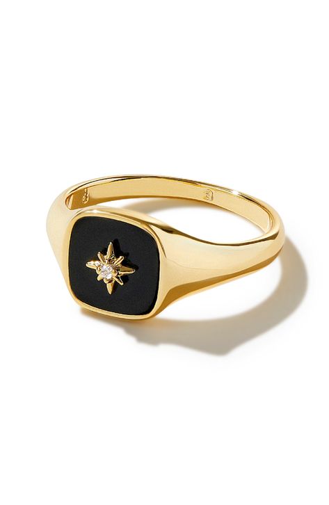 We heard you love bold accents, so we made you this gold signet ring to amp up your seasonal wardrobe. This bold ring is dipped in 14K gold and features an onyx stone beneath a unique star symbol. Wear this gold signet ring with our Amara Mother of Pearl ring for a juxtaposed look. Dipped in 14K gold Features an onyx stone Depth: 3.41mm - 0.13” Weight: 2.24g Crafted In China Signet Rings Women Vintage, Signet Jewelry, Gold Onyx Ring, Vintage Onyx Ring, 14k Gold Signet Ring, Star Symbol, Onyx Signet Ring, Jewelry Wishlist, Mother Of Pearl Ring