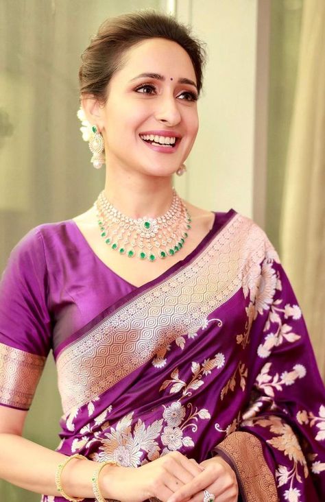 Pragya Jaiswal looks elegant in a banarasi silk saree at a shop opening! Pragya Jaiswal, Sleeveless Blouse Designs, Latest Silk Sarees, Sari Design, Floral Print Sarees, Purple Saree, Traditional Blouse Designs, Shop Opening, Half Saree Designs