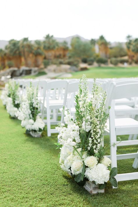 Read More: https://www.stylemepretty.com/2020/01/13/this-light-and-airy-desert-wedding-will-make-you-think-its-a-mirage/ Walkway Flowers, Aisle Inspiration, Aisle Florals, Air Force Wedding, Welsh Wedding, Wedding Aisle Outdoor, Light And Airy Wedding, Wedding Chuppah, Graduation Flowers