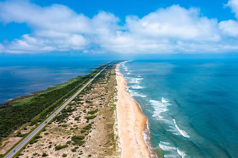 Hatteras Island - WorldAtlas Bodie Island Lighthouse, Beach Road Trip, East Coast Beaches, Cape Hatteras National Seashore, Hatteras Lighthouse, Cape Hatteras Lighthouse, Hatteras Island, Perfect Road Trip, Road Trip Routes