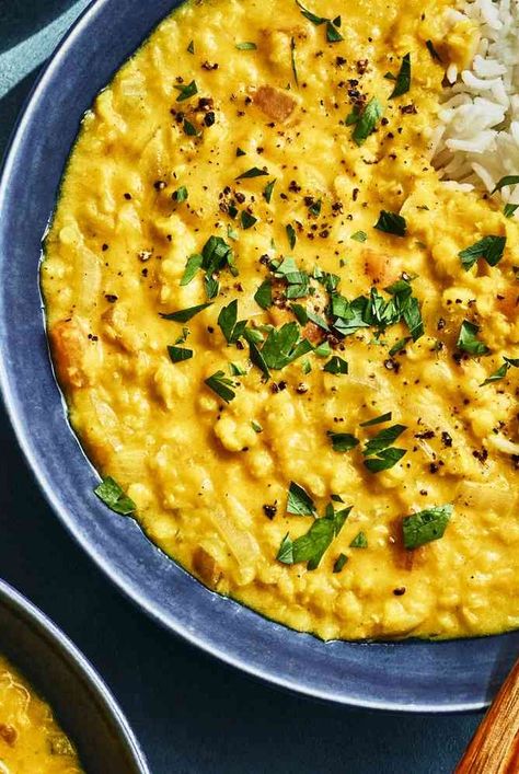 This coconut lentil recipe features coconut milk, turmeric, and ginger for a vegetarian curry perfect for serving with rice. Malagasy Coconut Lentils, Coconut Milk Lentils, Turmeric Coconut Milk, Benefits Of Fresh Ginger, Coconut Lentils, Lentil Recipe, Dinner 2023, Coconut Milk Rice, Winter Dinners