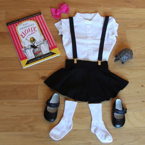 Simple & Inexpensive "Eloise" costume: 1) pink hair bow, 2) Circo white cuffed socks and Genuine Kids black Mary Janes from Target, 3) white button down and black skirt from Old Navy, 4) make-your-own mini suspenders with 1" black elastic and suspender clips from Joann's.  Don't forget Skipperdee (turtle) & Weenie (dog) props! Eloise Book Character Costume, Easy Book Day Costumes, Eloise Costume, Character Day Costumes, World Book Day Costume Ideas, Literary Costumes, Eloise At Christmastime, World Book Day Costume, Teacher Goals