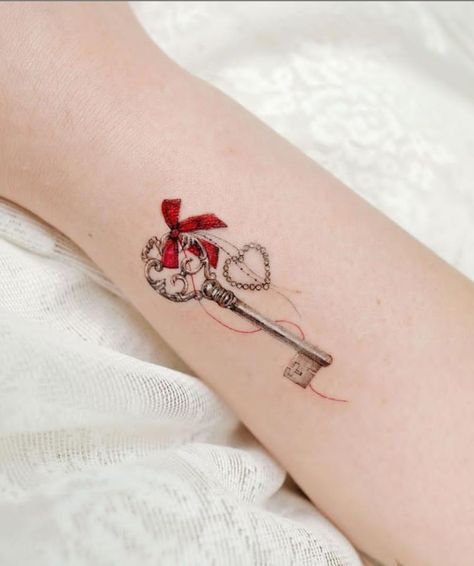 A women's lifestyle destination dedicated to style, entertainment, love, and living beautifully. Tattoo Key, Skeleton Key Tattoo, Key Tattoo Designs, Ankle Bracelet Tattoo, Key Tattoos, Key Tattoo, Finger Tattoo Designs, Fairy Tattoo Designs, Tasteful Tattoos