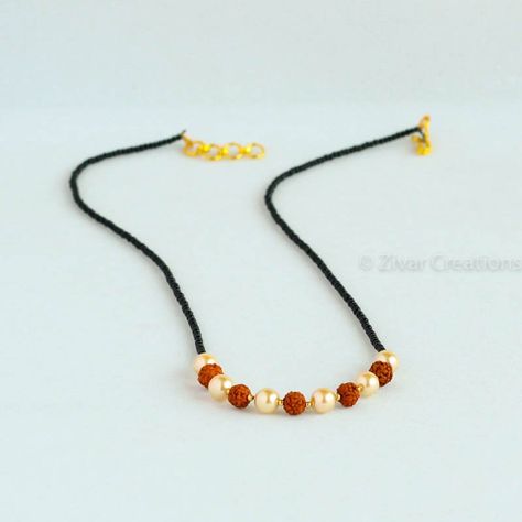 Rudraksh And Pearl Mangalsutra by ZivarCreations on Etsy Pearl Mangalsutra, Modern Mangalsutra, Silver Mangalsutra, Mangalsutra Design, Black Beads Mangalsutra, Black Beads Mangalsutra Design, Churidar Designs, Silk Jewelry, Gold Mangalsutra Designs