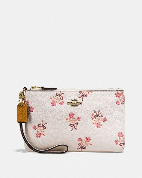 SMALL WRISTLET WITH FLORAL BOW PRINT Coach Wristlet Wallet, Small Wristlet, Bow Print, Handbag Collection, Girls Handbags, Luxury Purses, Coach Wristlet, Timeless Gifts, Cath Kidston