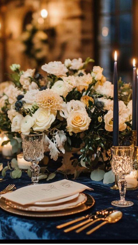 Navy and cream winter wedding table setting with navy tablecloths, cream napkins, gold cutlery, and elegant floral centerpieces. Black And Navy Wedding Theme, Navy And Cream Wedding Colors, Navy Blue Wedding Aesthetic, Navy Tablecloth Wedding, Navy And Champagne Wedding Colors, Navy And Gold Wedding Theme, Sapphire Wedding Theme, Navy And Champagne Wedding, Navy Blue Wedding Color Schemes