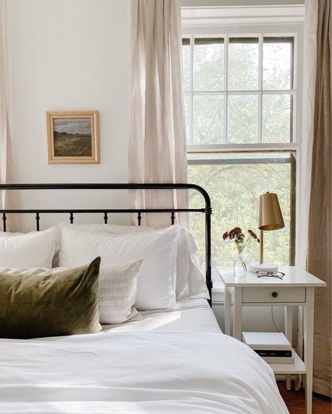 Metal Bed Guest Bedroom, Metal Bed Frame In Front Of Window, Metal Bed Styling, Black Metal Bed Frame Bedroom Decor, Black Metal Bed Frame Under Window, Minimal Guest Bedroom, Metal Bed Frame Bedroom, Minimalist Guest Bedroom, Black Iron Bed Decor