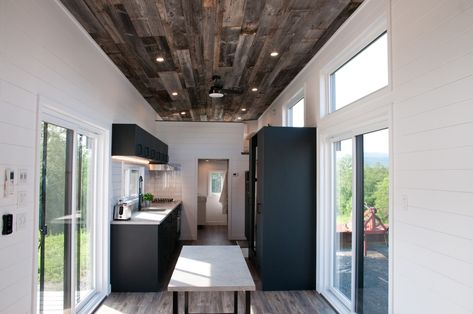 Baobab is comfortable inside, whatever the weather Spacious Tiny House, Barn Wood Ceiling, Double Sliding Glass Doors, Micro House Plans, Insulated Panels, Tiny House Floor Plans, Sleeping Loft, Open Living Room, Tiny House Movement