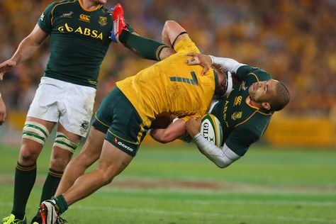 Michael Hooper of the Wallabies tackles Bryan Habana of the Springboks during The Rugby Championship match between the Australian Wallabies and the South African Springboks at Suncorp Stadium on September 7, 2013 in Brisbane, Australia. Rugby Injuries, Michael Hooper, Rugby Tackle, Rugby 7s, Springbok Rugby, Where To Invest, Super Rugby, Rugby Men, Property Investment