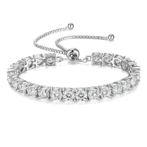 PRICES MAY VARY. Genuine Moissanite Bracelet: This moissanite diamond bracelet is made of moissanite, it's strong, bright white, has incredible sparkle. the fire is 2.5 times that of a South African diamond. A classic and elegant style that fits everyone. Fall in love with the world’s most perfectly cut, giving you and your love the most spectacularly bright and shimmering stone to forever memorialize your bond. Adjustable Bolo Bracelets for Women: Tennis bracelets for women are designed with a Moissanite Bracelet, Special Occasion Jewelry, Large Jewelry, Fancy Jewelry, Diamond Bracelets, Bridesmaid Jewelry, Moissanite Diamonds, Tennis Bracelet, High Quality Jewelry