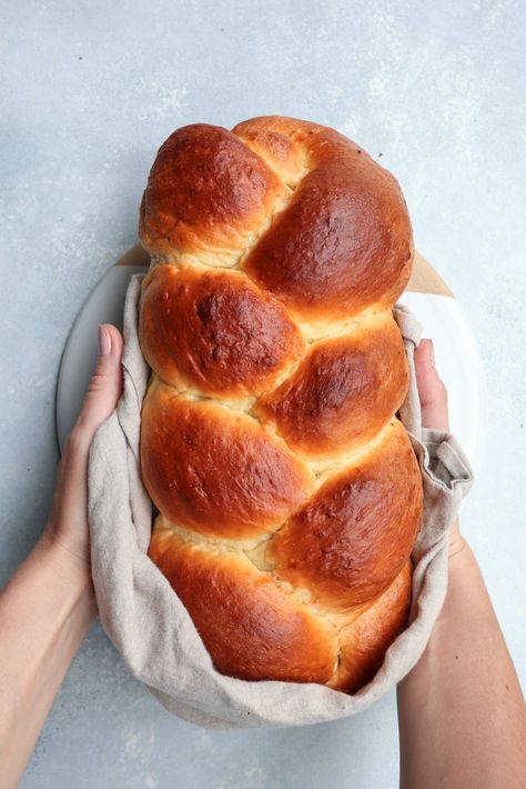 tsoureki (greek easter bread) | cait's plate Greek Fish Recipes, Easter Bread With Raisins, Meatless Snacks, Easter Food Recipes, Greek Fish Recipe, Tsoureki Recipe, Bread With Raisins, Greek Easter Bread, Greek Fish