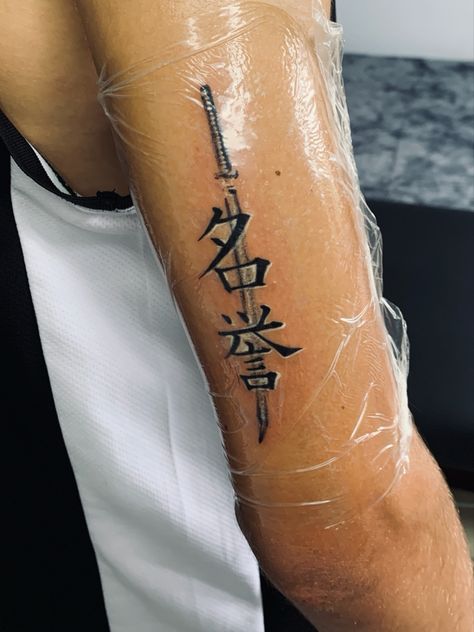 Kaizen Symbol Tattoo, Japanese Tricep Tattoo, Kaizen Tatto Idea, Kaizen Japanese Tattoo Ideas, Minimalist Tattoos Men, Japanese Calligraphy Tattoo, Japanese Kanji Tattoos, Kaizen Japanese Tattoo, Chinese Writing Tattoos