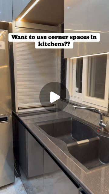 Interior Designer on Instagram: "Rolling Shutters🧑‍🍳 . . . . Roller shutters provide a elegant feel with great functionality becoming main attraction of your kitchen. They leave your kitchen transformed and reward it with the luxury of space. The range ensures easy workability, smooth motion and unhindered access to the storage items while you work. They can be used in a variety of ways including but not limited to storing: small crockery, small oven, air fryers, etc.  . . #kitchendesign #kitchen #rollingshutter #rollingshutterdoor #kitchenware #kitchenrenovation #kitchenofinstagram" Oven Space In Kitchen, Small Kitchen Oven Ideas, Corner Shutter Kitchen, Kitchen Interior For Small Spaces, Rolling Shutter Kitchen Cabinet, Kitchen Roller Shutter Cabinet, Roller Shutter In Kitchen, Kitchen Store Room Ideas, Kitchen Store Room Ideas Indian