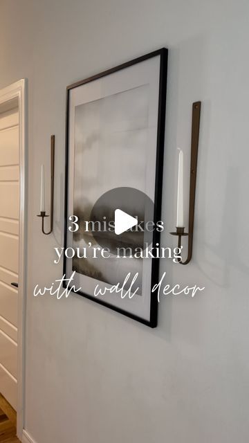 Katie Cole | Home Decor & Design on Instagram: "3 mistakes you’re making with wall decor:

- Hanging art or frames too high or too low. The center should be eye level (roughly 58 inches from the floor)

- Placing them too far apart. When hanging art or frames together, the space between should be no more than 3 inches apart.

- Picking the wrong size for the space. (Usually this is too small.) Remember, on an empty wall your subject should cover 60-75% of the available space. When in doubt think, “big wall, big things.” 😉

I got this oak frame on Amazon and I love it! It comes in 3 different colors and sooo many sizes! Comment “SHOP” for the link." Decor Hanging, Big Things, Empty Wall, Hanging Art, I Got This, Things To Come, Flooring, Wall Decor, Frame