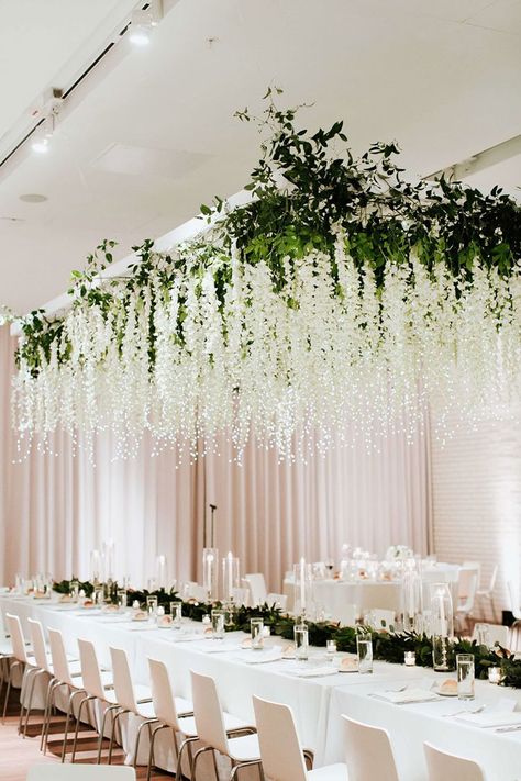 Most Magical Hanging Floral Installation With Fairy Lights ~ loving this display by Stems Floral Design + Production featuring fairy lights and hanging white wisteria Hanging Flowers Wedding, Wisteria Wedding, Vine Decoration, Beautiful Wedding Centerpiece, Flower Ceiling, Wedding Ceiling, Table Centerpiece Decorations, Arch Decoration Wedding, Hanging Garland