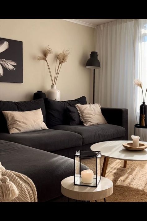 Dark Couch Neutral Living Room, Black Couch Beige Walls, Black Couch Beige Decor, Black Gray And Beige Living Room, Japandi Black Couch, Living Rooms With Dark Couches, Dark Neutral Living Room Cozy, Black And Beige Living Room Decor, Black And Beige Aesthetic Living Room